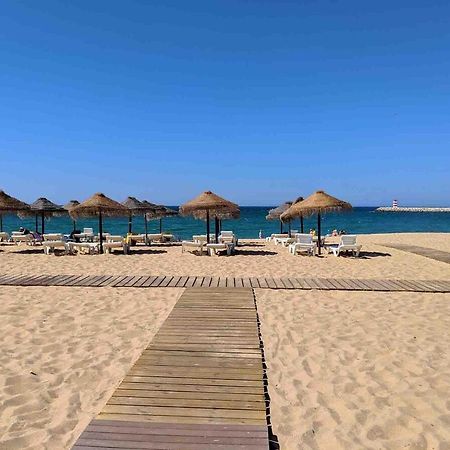 Apartamento Frente Ao Mar Com Piscina De Agua Salgada Quarteira Bagian luar foto
