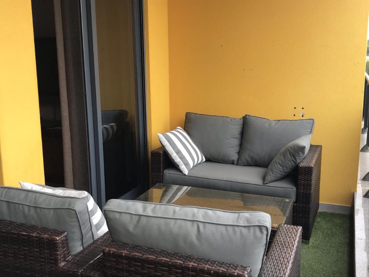 Apartamento Frente Ao Mar Com Piscina De Agua Salgada Quarteira Bagian luar foto